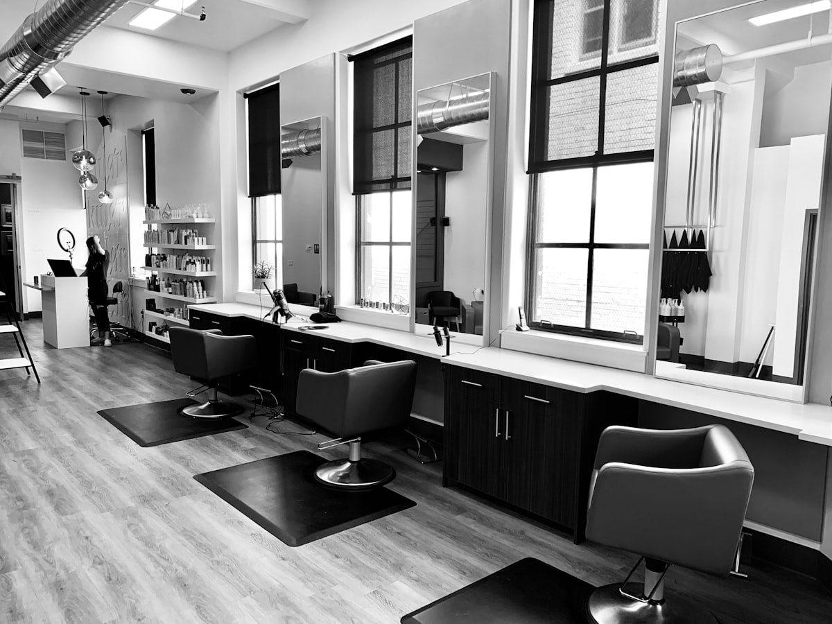 Salon interior with styling chairs and mirrors